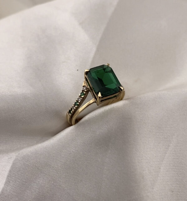 Emerald Cut Accent Split Memorial Chamber Ring